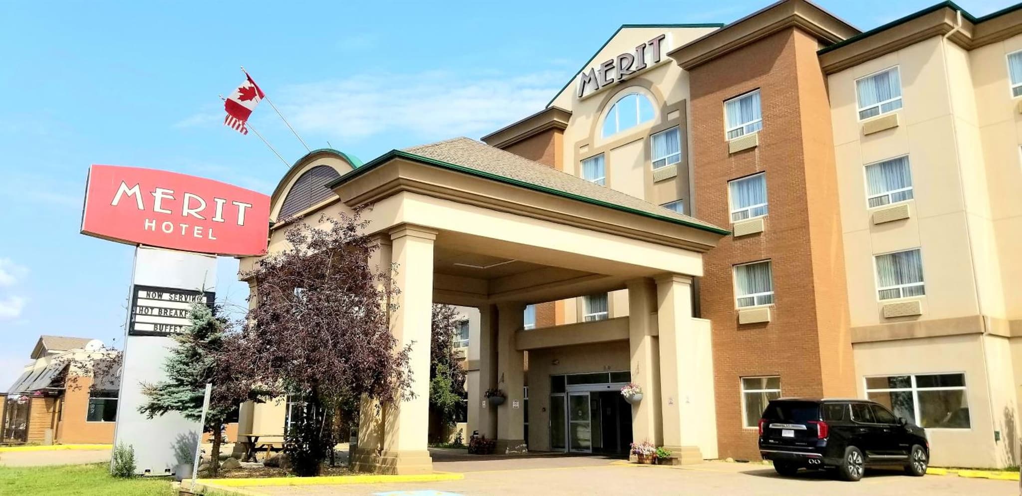 Merit Hotel & Suites