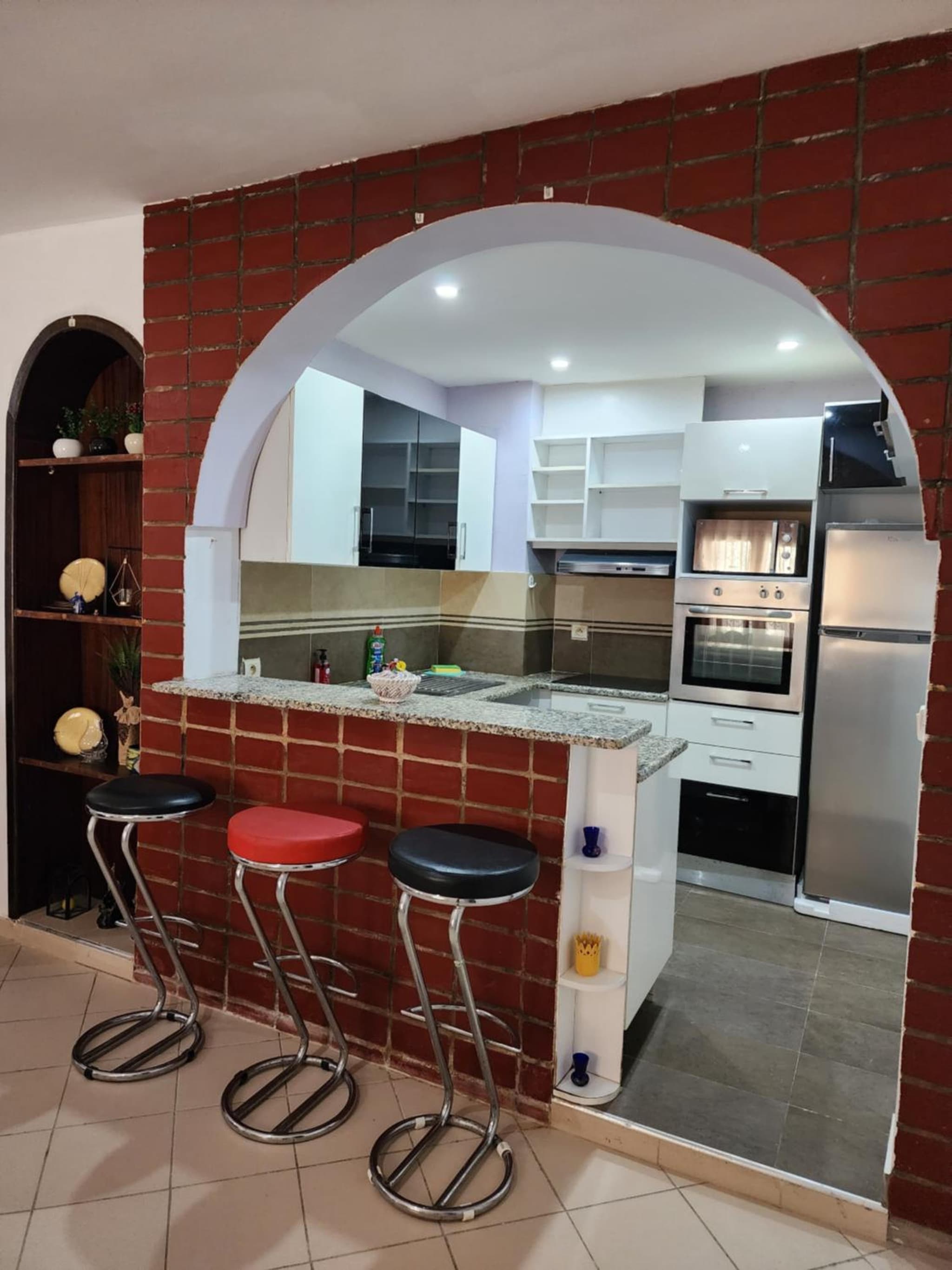 Duplex bien equipe securise avec jardin et veranda photo 9