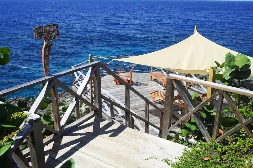 5 different SEA side cottages in TROPICAL garden