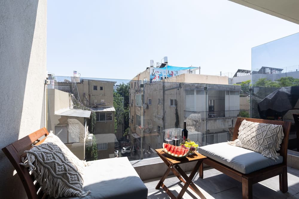 Chic Urban Getaway with Balcony & Mamad by Sea N Rent photo 9