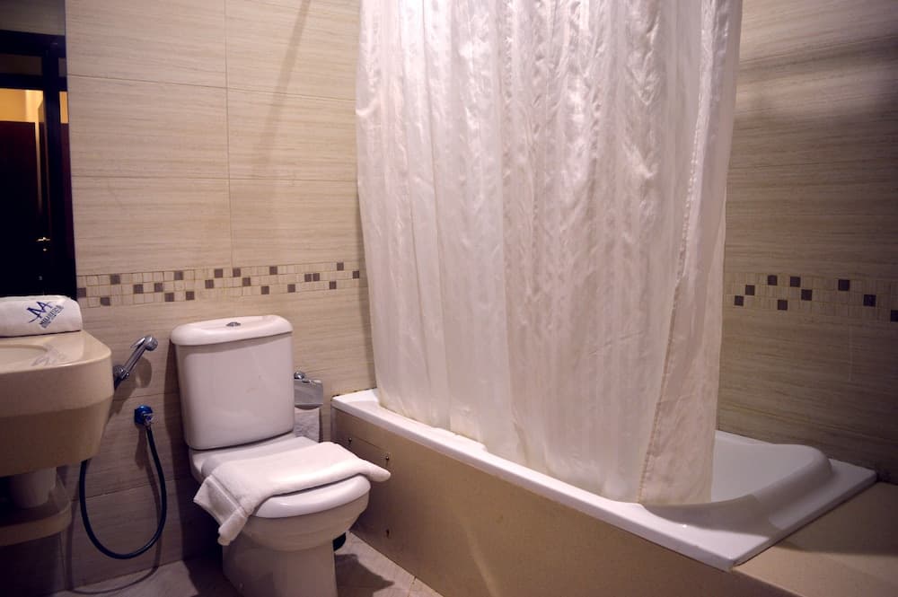 Milestone Hotel Apartment photo 6